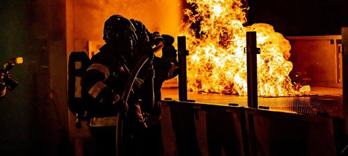 firemen-extinguishing-office-flames